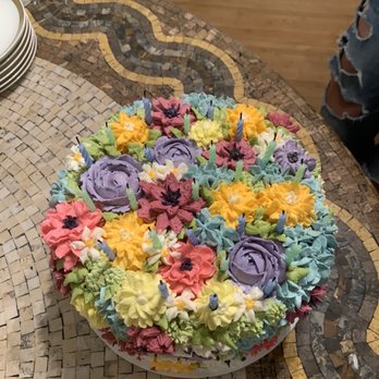 The Sweet City Cupcakes - a cake decorated with flowers - Cupcakes Near Me - Saint Augustine, Florida The Sweet City Cupcakes - a cake decorated with flowers - Cupcakes Near Me - Saint Augustine, Florida