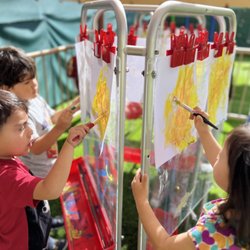 Sierra Preschool & After School - Painting the sun.