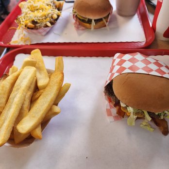 Biggie's Burgers - Top: Cheeseburger with Chili cheese fries Bottom: Bacon cheeseburger with steak fries. - Burgers Near Me - San Clemente, California Biggie's Burgers - Top: Cheeseburger with Chili cheese fries Bottom: Bacon cheeseburger with steak fries. - Burgers Near Me - San Clemente, California