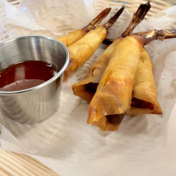 Totally Thai - A8. Shrimp In A Blanket Shrimp wrapped in crispy egg roll skins served with sweet chili sauce. - Thai Near Me - Elizabeth City, North Carolina Totally Thai - A8. Shrimp In A Blanket Shrimp wrapped in crispy egg roll skins served with sweet chili sauce. - Thai Near Me - Elizabeth City, North Carolina