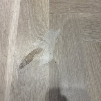 5280 Floors - a person's shadow on the floor - Flooring Near Me - Denver, Colorado