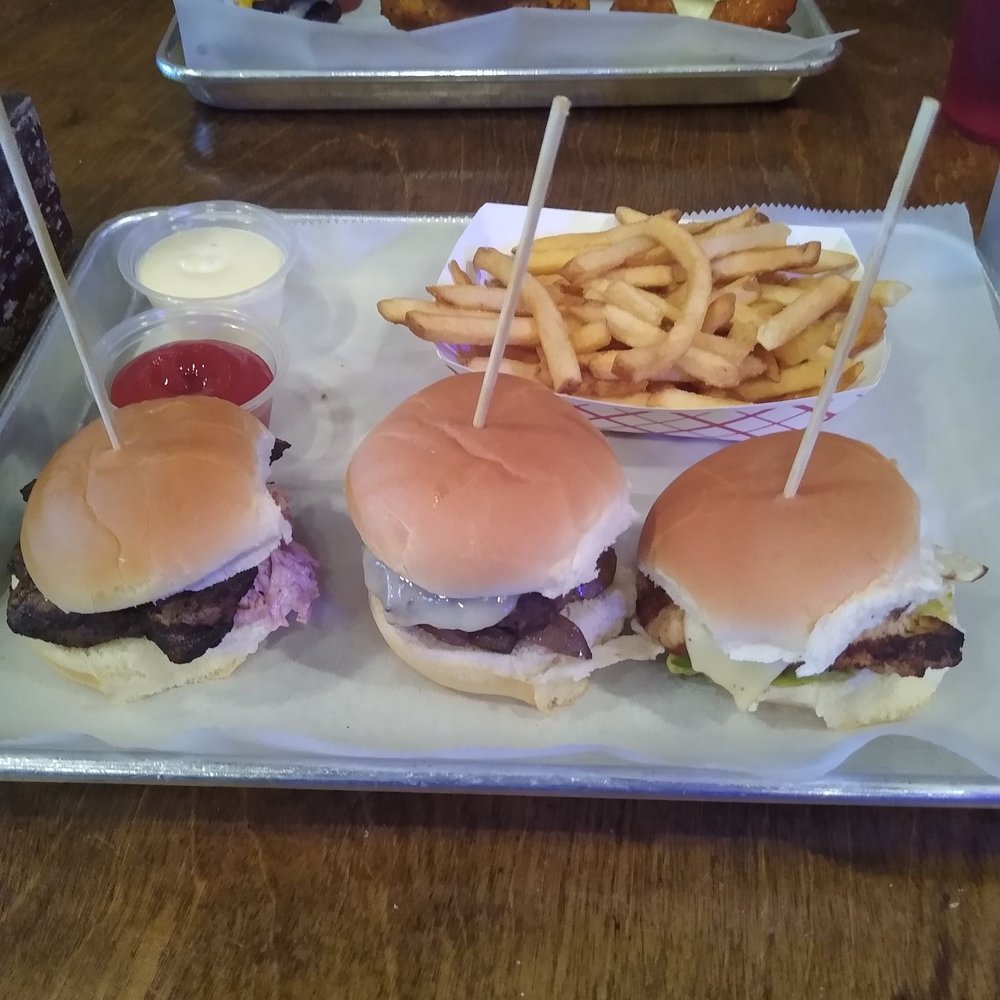 On the top are the shortening Fries. From left to right are This Pork is a Jerk, Mushroom and Swiss, and the Lowrider