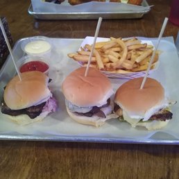 On the top are the shortening Fries. From left to right are This Pork is a Jerk, Mushroom and Swiss, and the Lowrider On the top are the shortening Fries. From left to right are This Pork is a Jerk, Mushroom and Swiss, and the Lowrider