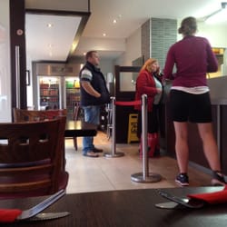 Carlo's Fish And Chips - Seating and takeaway