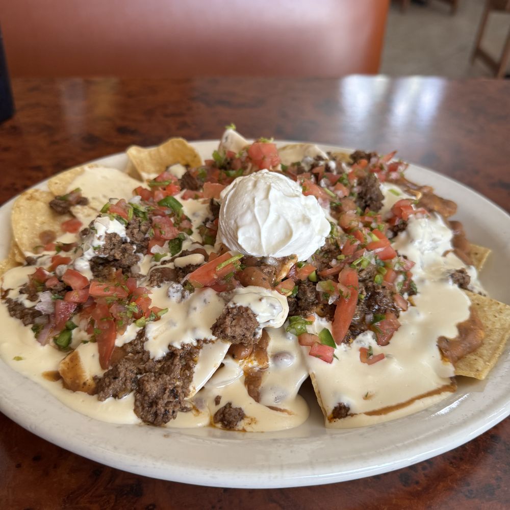 Fat Boy Roundup - Nachos with beef, bean and queso sauce - Burgers Near Me - Round Mountain, Texas Fat Boy Roundup - Nachos with beef, bean and queso sauce - Burgers Near Me - Round Mountain, Texas