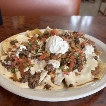 Fat Boy Roundup - Nachos with beef, bean and queso sauce - Burgers Near Me - Round Mountain, Texas Fat Boy Roundup - Nachos with beef, bean and queso sauce - Burgers Near Me - Round Mountain, Texas