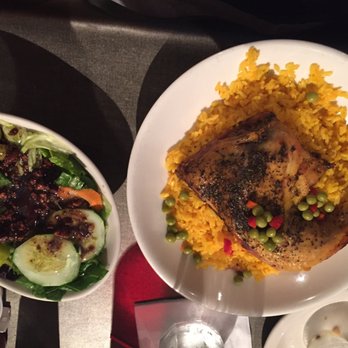 Ybor Grille - Arroz con Pollo with side salad - Cuban Near Me - Ruskin, Florida