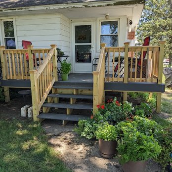Crossbones Contracting - a porch with steps leading up to a house - General Contractors Near Me Crossbones Contracting - a porch with steps leading up to a house - General Contractors Near Me