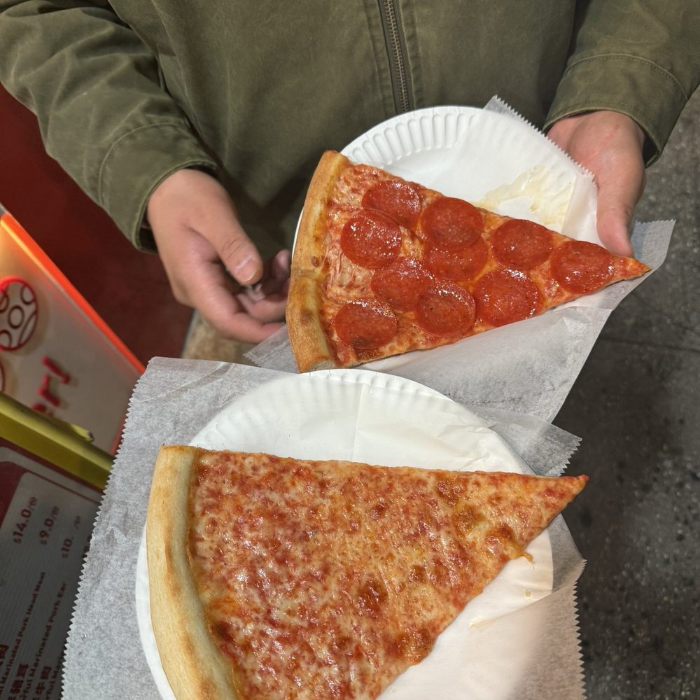 Lucia Pizza - Cheese and pepperoni pizza slice - Pizza Near Me - Flushing, New York Lucia Pizza - Cheese and pepperoni pizza slice - Pizza Near Me - Flushing, New York