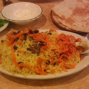 Saffron Persian Cafe - a plate of food on a table - Persian/Iranian Near Me - Houston, Texas Saffron Persian Cafe - a plate of food on a table - Persian/Iranian Near Me - Houston, Texas