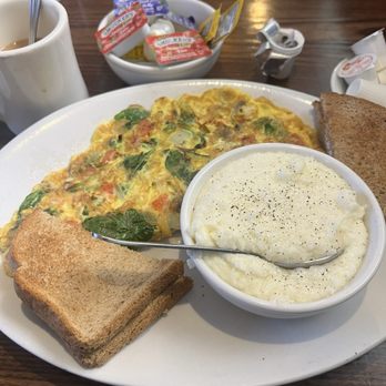 State Street Cafe - Avocado omelette with grits and toast - Salad Near Me - North Haven, Connecticut State Street Cafe - Avocado omelette with grits and toast - Salad Near Me - North Haven, Connecticut
