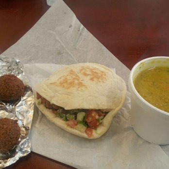 Taza Cafe - Falafel sandwich, extra salad and the most amazing lentil soup!  Also, side of falafels.  This is my only meal of the day and well worth it. - Greek Near Me - Chicago, Illinois