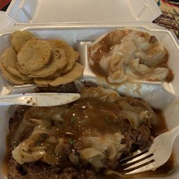Hamburger steak with onions and gravy, fried squash, mashed potatoes