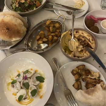 Ammatoli - Spicy Hummus Mezza Hummus Topped with Shawarma Falafel Mezza Fattoush Freekeh with cucumber & yogurt salad - Mediterranean Near Me - Long Beach, California