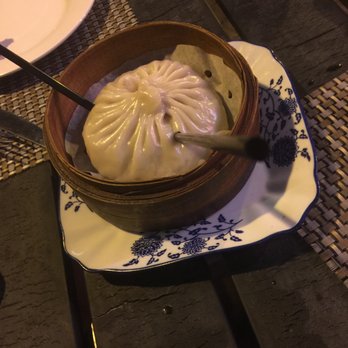 District Kitchen - House Special XXL Dumpling with straw - Chinese Near Me - Malden, Massachusetts District Kitchen - House Special XXL Dumpling with straw - Chinese Near Me - Malden, Massachusetts