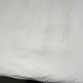 Infinity Lofts In The Gulch - Stains on bedding - Apartments Near Me - Nashville, Tennessee