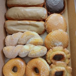 Angel Food Donuts - Maple bars, sugar twist, glazed, old fashioned, lemon, raspberry and custard filled
