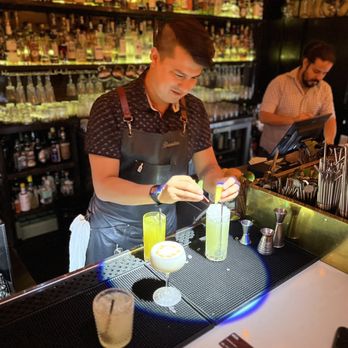 The Roosevelt Room - Brandon under the spotlight making great cocktails - Cocktail Bars Near Me - Austin, Texas The Roosevelt Room - Brandon under the spotlight making great cocktails - Cocktail Bars Near Me - Austin, Texas