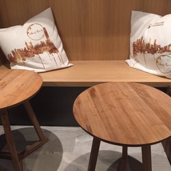 The Coffee Academics - Small seating area on ground level. Love their personalized pillows.