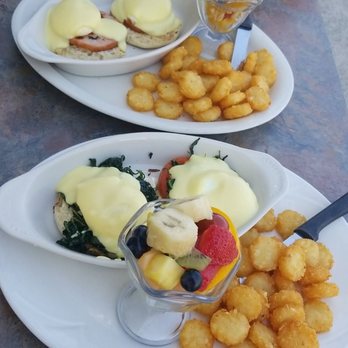 The Jellyfish Cafe - Eggs Benedict (top) and florentine Benedict (bottom) Both with fresh fruit and tater tots - American Near Me - Wildwood Crest, New Jersey The Jellyfish Cafe - Eggs Benedict (top) and florentine Benedict (bottom) Both with fresh fruit and tater tots - American Near Me - Wildwood Crest, New Jersey