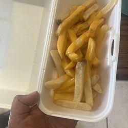 El Guero Hot Dogs - $4.00 papá con queso