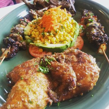 Nailah's kitchen - Created our own trio with the half chicken, lamb slices, and lamb kebabs (don't remember the official names, sorry!). - Senegalese Near Me - Baltimore, Maryland Nailah's kitchen - Created our own trio with the half chicken, lamb slices, and lamb kebabs (don't remember the official names, sorry!). - Senegalese Near Me - Baltimore, Maryland
