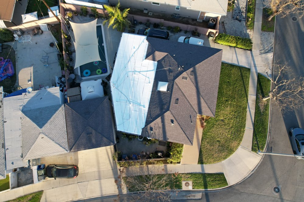 Slide of Enriquez Roofing