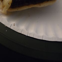 Lorenzo’s Pizza - Cheese bread burnt blackened inedible