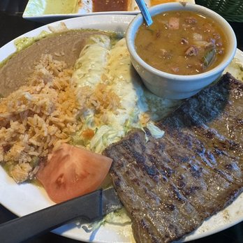 Chile Verde Mexican Restaurant - 1.12.24 Todays special: sweet tea with Enchiladas verdes, skirt steak, rice, refried beans, and salad. paid $1 for borracho beans - Mexican Near Me - San Antonio, Texas Chile Verde Mexican Restaurant - 1.12.24 Todays special: sweet tea with Enchiladas verdes, skirt steak, rice, refried beans, and salad. paid $1 for borracho beans - Mexican Near Me - San Antonio, Texas