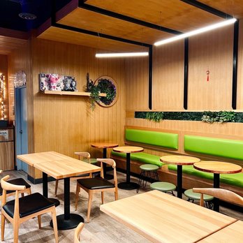 Matcha En - tables and chairs in a restaurant - Desserts Near Me - Chicago, Illinois Matcha En - tables and chairs in a restaurant - Desserts Near Me - Chicago, Illinois