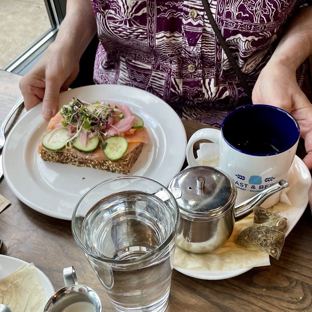 Toast & Berry - Luscious Smoked Salmon Toast, multigrain toast, caper-dotted cream cheese, cucumber, red onion, microgreens. And Earl Grey tea. - Breakfast & Brunch Near Me - Montgomery, Ohio Toast & Berry - Luscious Smoked Salmon Toast, multigrain toast, caper-dotted cream cheese, cucumber, red onion, microgreens. And Earl Grey tea. - Breakfast & Brunch Near Me - Montgomery, Ohio