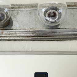 HomeRiver Group Sacramento Property Management - Light fixture that wasn't cleaned.