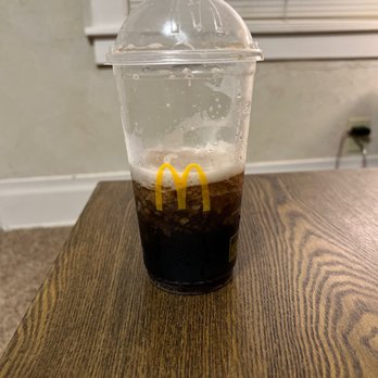 McDonalds - a plastic cup of coffee on a table - Coffee & Tea Near Me - Sugar Grove, Illinois