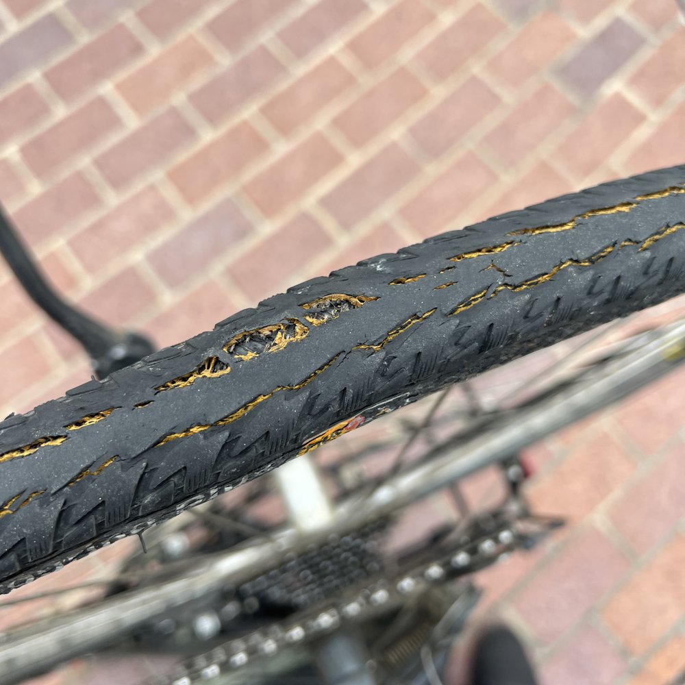 The tyre they wouldn't replace. I did 7 miles after taking this photo before finally replacing it at home.