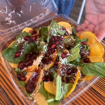 Speak Cheezy - Arugula salad with persimmon, walnuts and pomegranate vinaigrette. - Pizza Near Me - Long Beach, California Speak Cheezy - Arugula salad with persimmon, walnuts and pomegranate vinaigrette. - Pizza Near Me - Long Beach, California