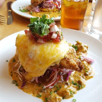 Savorez - Breakfast of Champions brunch item. One of the best brunches we've ever had! Fried chicken, chorizo gravy, arepa and fried egg. Yumm!!! - Latin American Near Me - Wilmington, North Carolina Savorez - Breakfast of Champions brunch item. One of the best brunches we've ever had! Fried chicken, chorizo gravy, arepa and fried egg. Yumm!!! - Latin American Near Me - Wilmington, North Carolina
