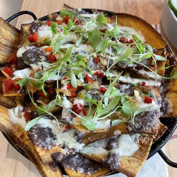 Colada Shop - Platanachos (plantain chip nachos) - $9 at happy hour - Coffee & Tea Near Me - Arlington, Virginia Colada Shop - Platanachos (plantain chip nachos) - $9 at happy hour - Coffee & Tea Near Me - Arlington, Virginia