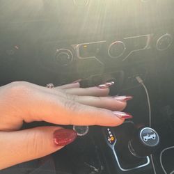 Nails pointing upward after being requested to curve down.