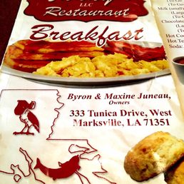a breakfast menu and a cup of coffee