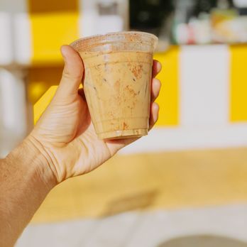 Superba Snacks + Coffee - Spanish Latte in front of ordering area - Cafes Near Me - Los Angeles, California