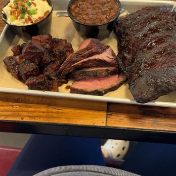 Sauced BBQ & Spirits - BBQ Combo 3-meat (Ribs, Tri-Tip, Burnt Ends) side of Baled Beans and Potatoe Salad - Barbeque Near Me - Irvine, California Sauced BBQ & Spirits - BBQ Combo 3-meat (Ribs, Tri-Tip, Burnt Ends) side of Baled Beans and Potatoe Salad - Barbeque Near Me - Irvine, California