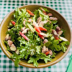 Il Fiorello Olive Oil - Women' Day Brunch Farm fresh salad Kale, microgreens, pickled chard stems, candied almonds, lemon vinaigrette.