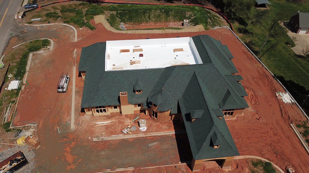 Slide of Academy Roofing