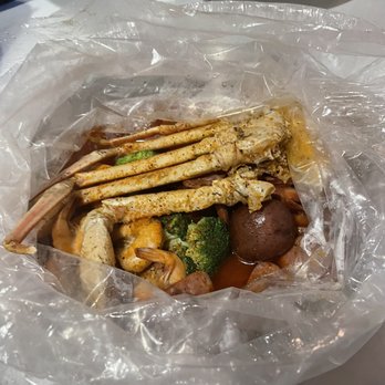 Jumbo Crab - Snow crab, Shrimp (No Head), sausage boil with potatoes, broccoli and a piece of corn. I got Cajun sauce in a medium spice. - Cajun/Creole Near Me - Tinley Park, Illinois