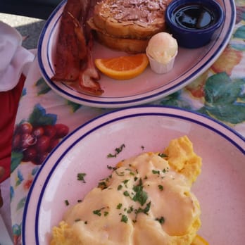 Red Apple Cafe - Bear claw french toast with three sausages  or three pieces of thick bacon. We added the side of eggs. - Breakfast & Brunch Near Me - Aptos, California
