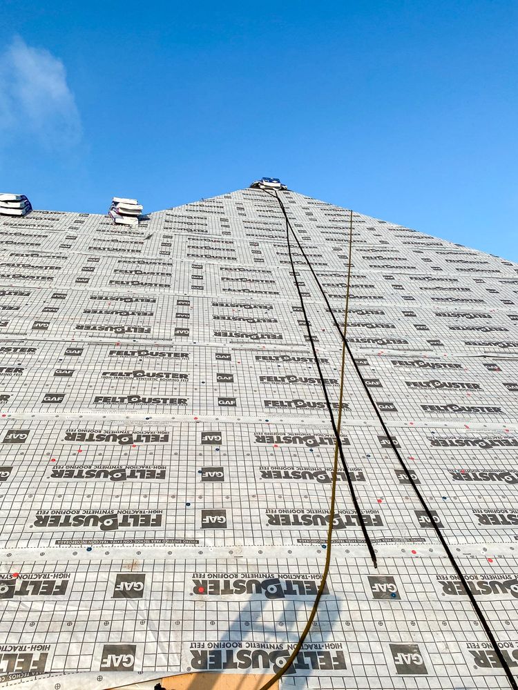 Slide of Tucker Roofing Systems