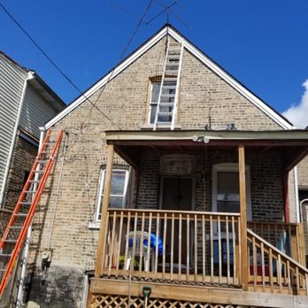Miranda's Remodeling - a house with a ladder and ladders - Flooring Near Me Miranda's Remodeling - a house with a ladder and ladders - Flooring Near Me