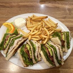 Classic Turkey Club Sandwich. I added avocado and had fries. Very good but could've used another piece of bacon. Classic Turkey Club Sandwich. I added avocado and had fries. Very good but could've used another piece of bacon.