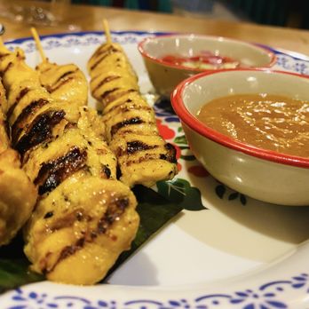 Mae Ornnit Thai Kitchen - Chicken satay served with peanut sauce - Thai Near Me - Annandale, Virginia Mae Ornnit Thai Kitchen - Chicken satay served with peanut sauce - Thai Near Me - Annandale, Virginia