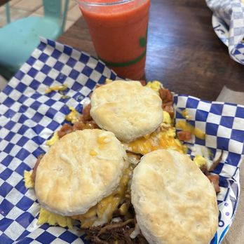 Biscuit Slider Trio- biscuit, egg, cheese and bacon, Portuguese sausage or kalua pork